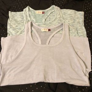 Two like new workout razor back tanks